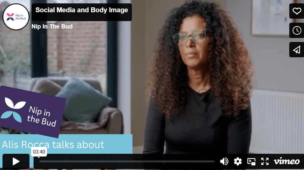 Alis Rocca sits in front of a camera